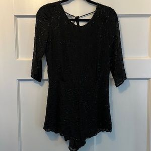 FREE PEOPLE - black sequence romper with scoop back